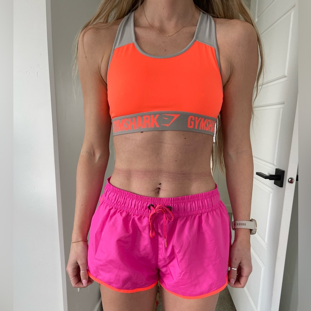 Neon pink running shorts. Size S. Worn twice.